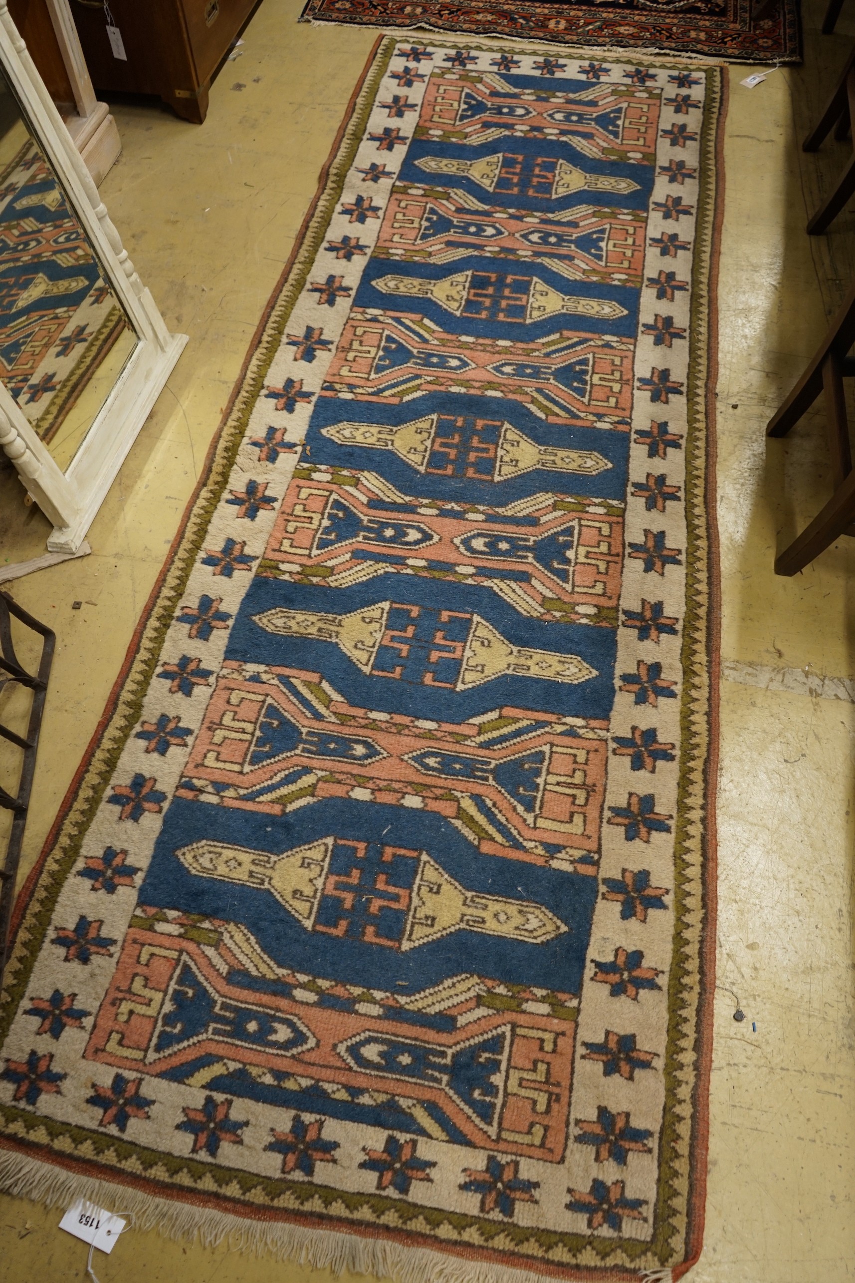 A Caucasian style blue ground runner, 264 x 90cm